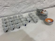 Quantity of Various Espresso Cups and Saucers