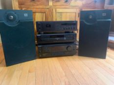 Stereo System inc. Cassette Player, CD Player, Radio Receiver and 2 Speakers.