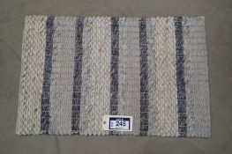 Braided Wool 2'x3' Area Rug.