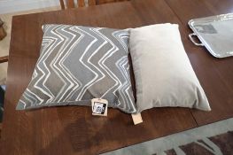 Lot of 24"x13" Throw Pillow and 24" Square Throw Pillow.