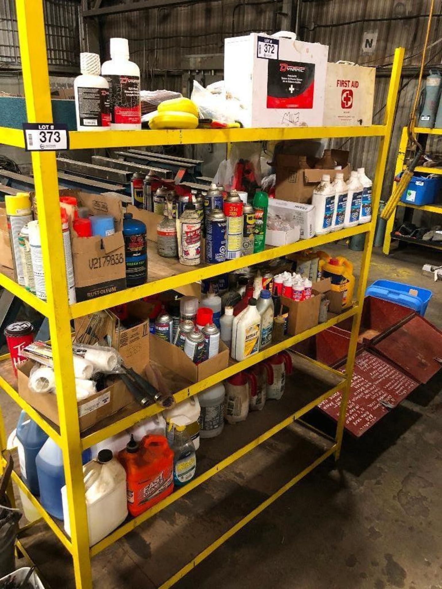 Contents of Shelving including First Aid Kits, CPR Pocket Masks, Eye Wash, Spray Paint, Paint Roller