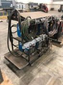 Lot of Miller 4-pack w/(4) Miller XMT304 CC/CV Welders, Cart, Cables, etc.