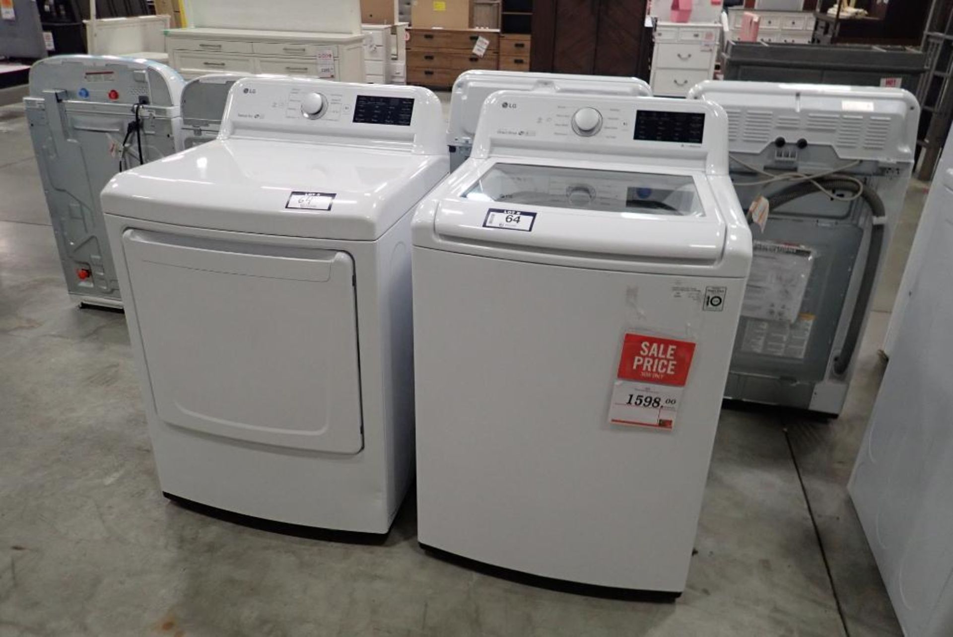 LG Top Load WT7100CW Washer and Front Load DLE7100W Electric Dryer.