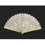 A CHINESE EXPORT ARMORIAL IVORY BRISE FAN, CIRCA 1810