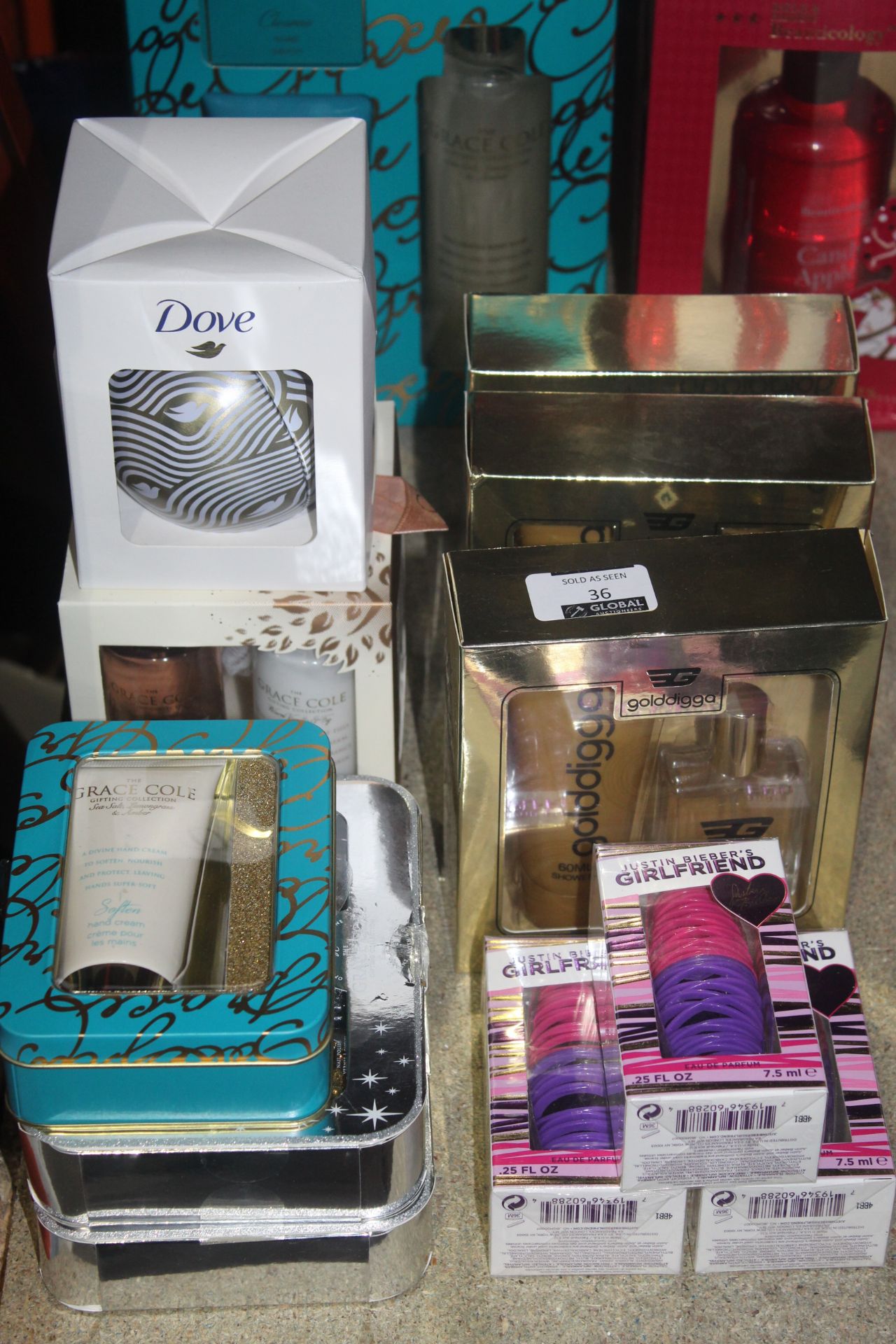 Assorted Boxed Gift Items To Include Gold Digger Shower and Gel Perfume Sets, Justin Bieber