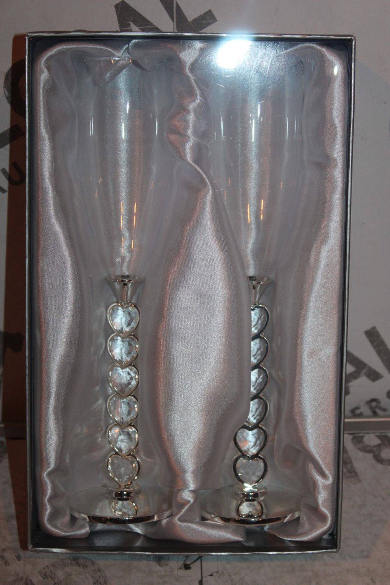 Lot to Contain 10 Pairs of Heart Stem Champagne Flutes Combined RRP £200