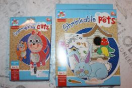 Lot to Contain 34 Brand New Assorted Kids Corrugated Cats and Shrinkable Pets