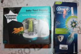 Lot to Contain 2 Boxed Assorted Items to Include a Oral B Pro 600 Toothbrush and a Tommie Tippee