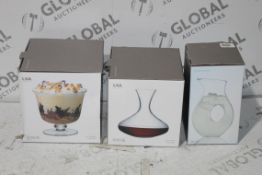 Boxed Assorted LSA International Items to Include a Serve Tall Compote Dish, Wine Carafe and a Ono