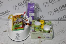 Assorted Items to Include a Jelly Cat Unicorn Money Box, Jungle Tales Sensory Book, Peter Rabbit