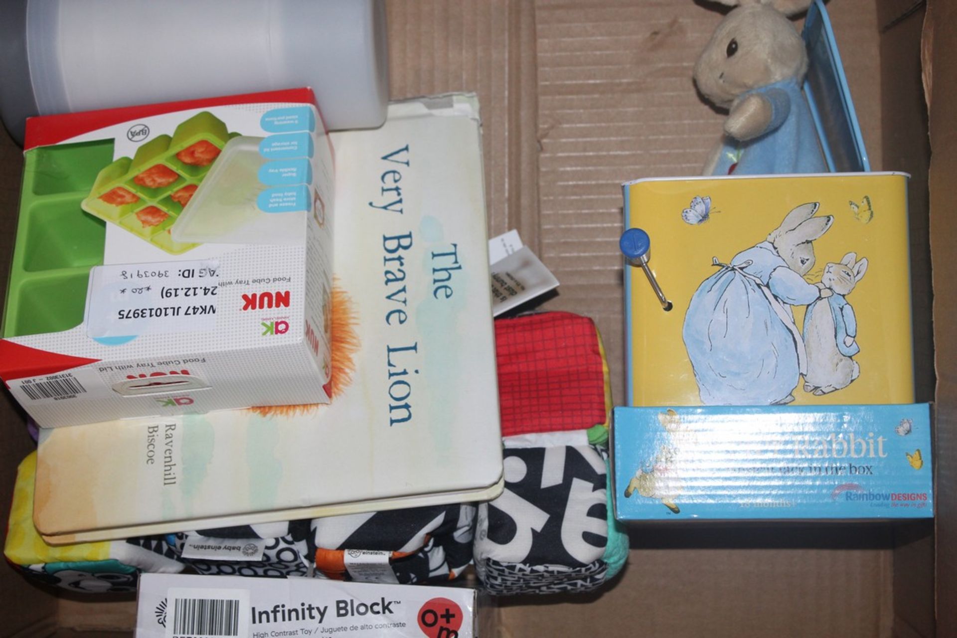 Assorted Children's Toy Items to Include Peter Rabbit Musical Jackinabox, Nuk Food Cube Freezers,