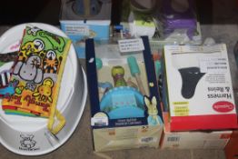 Assorted Items to Include a Jelly Cat Unicorn Money Box, Jungle Tales Sensory Book, Peter Rabbit