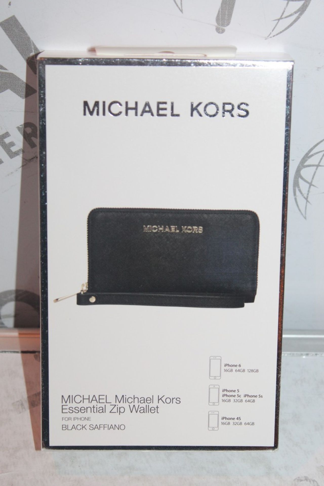 Lot To Contain Two Michael Kors essential Zipp Black Saffiano Wallets With Phone compartments,