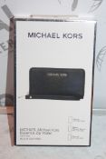 Lot To Contain Two Michael Kors essential Zipp Black Saffiano Wallets With Phone compartments,