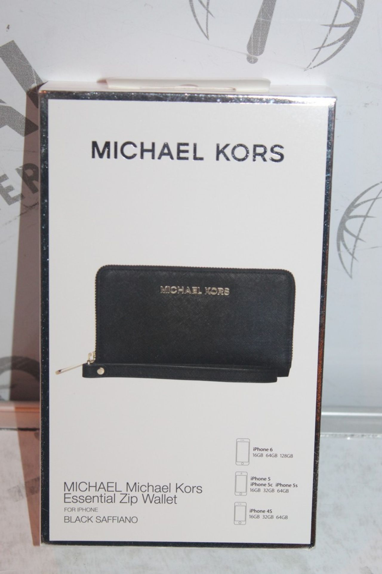 Lot To Contain Two Michael Kors essential Zipp Black Saffiano Wallets With Phone compartments,