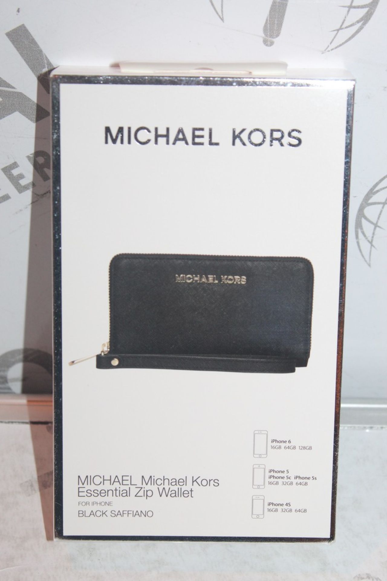 Lot To Contain Two Michael Kors essential Zipp Black Saffiano Wallets With Phone compartments,