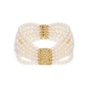 5 Strand pearl bracelet with a gold plated clasp i