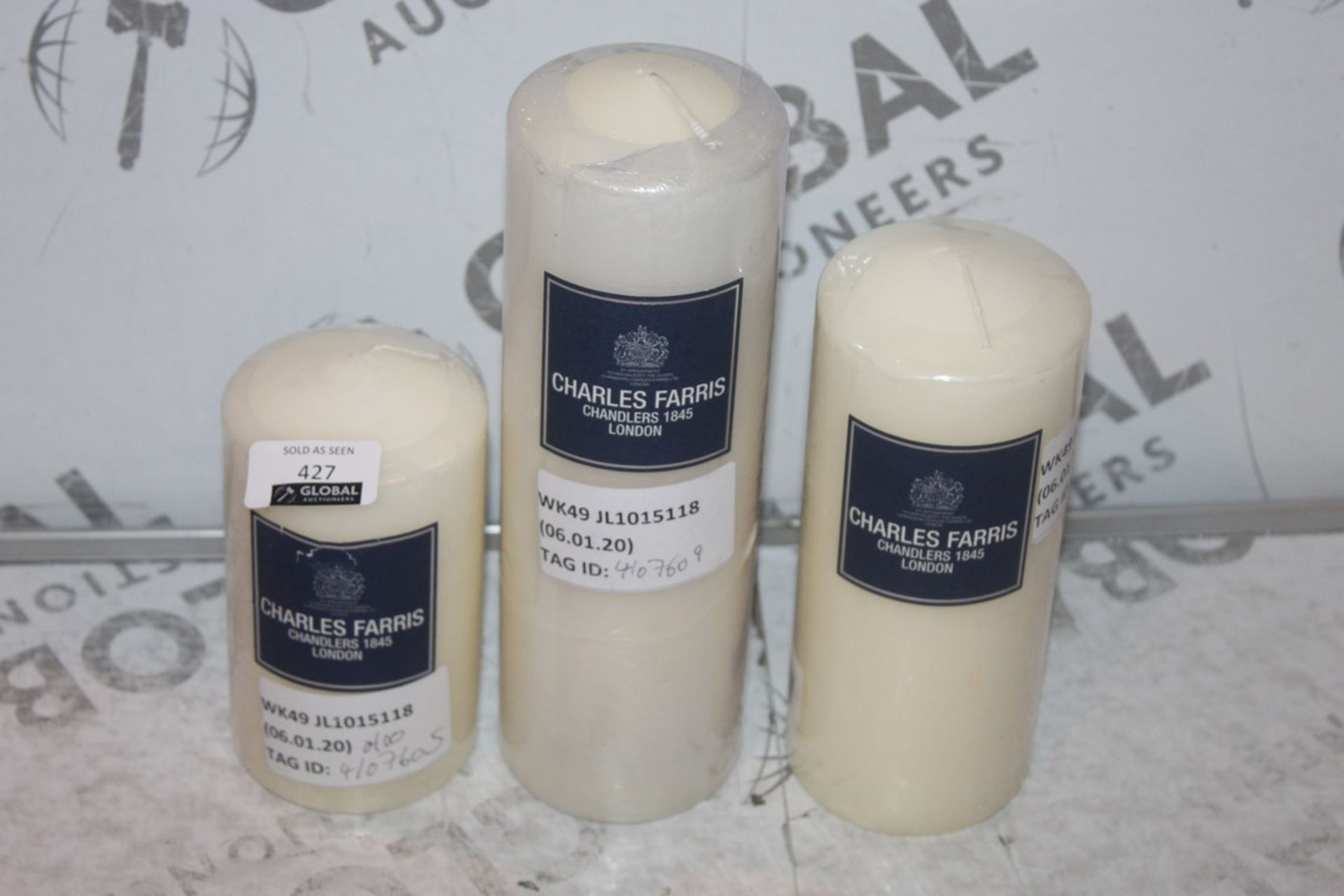 Lot to Contain 4 Assorted Small Medium and Large Pillar Candles and a Pack of 10 Dining Candles