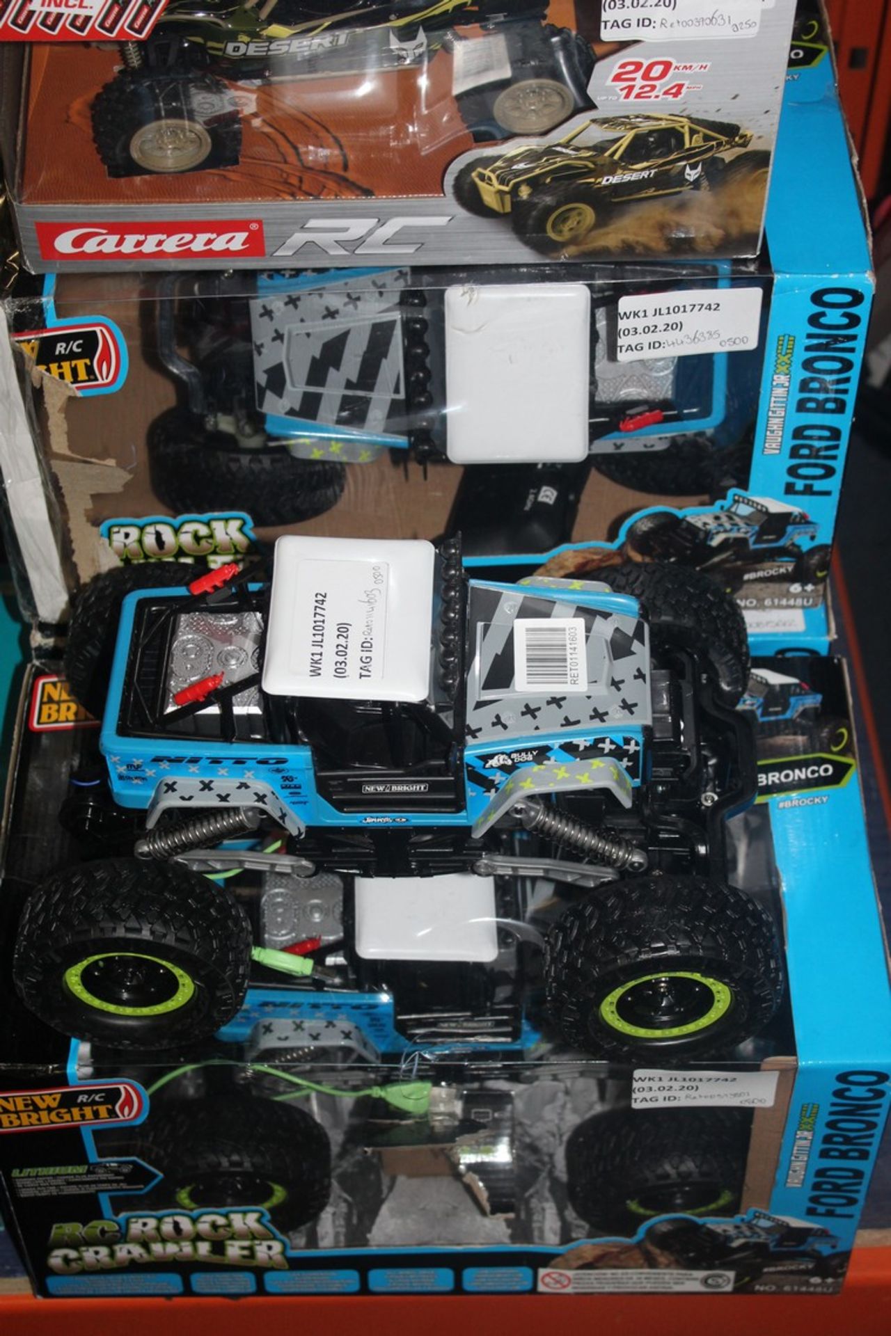 Assorted Boxed and Unboxed New Bright Remote Control Cars and Carrera Desert Buggys RRP £40 - £50