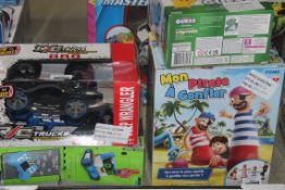 Assorted Children's Toy Items to Include a Pokémon Guess the Trainer Toy Ball, Pop Up Pirate, New