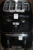 Lot To Contain 1 Unboxed Breville 4 Slice Toaster And Delonghi 4 Slice Toaster RRP £90 (Untested/