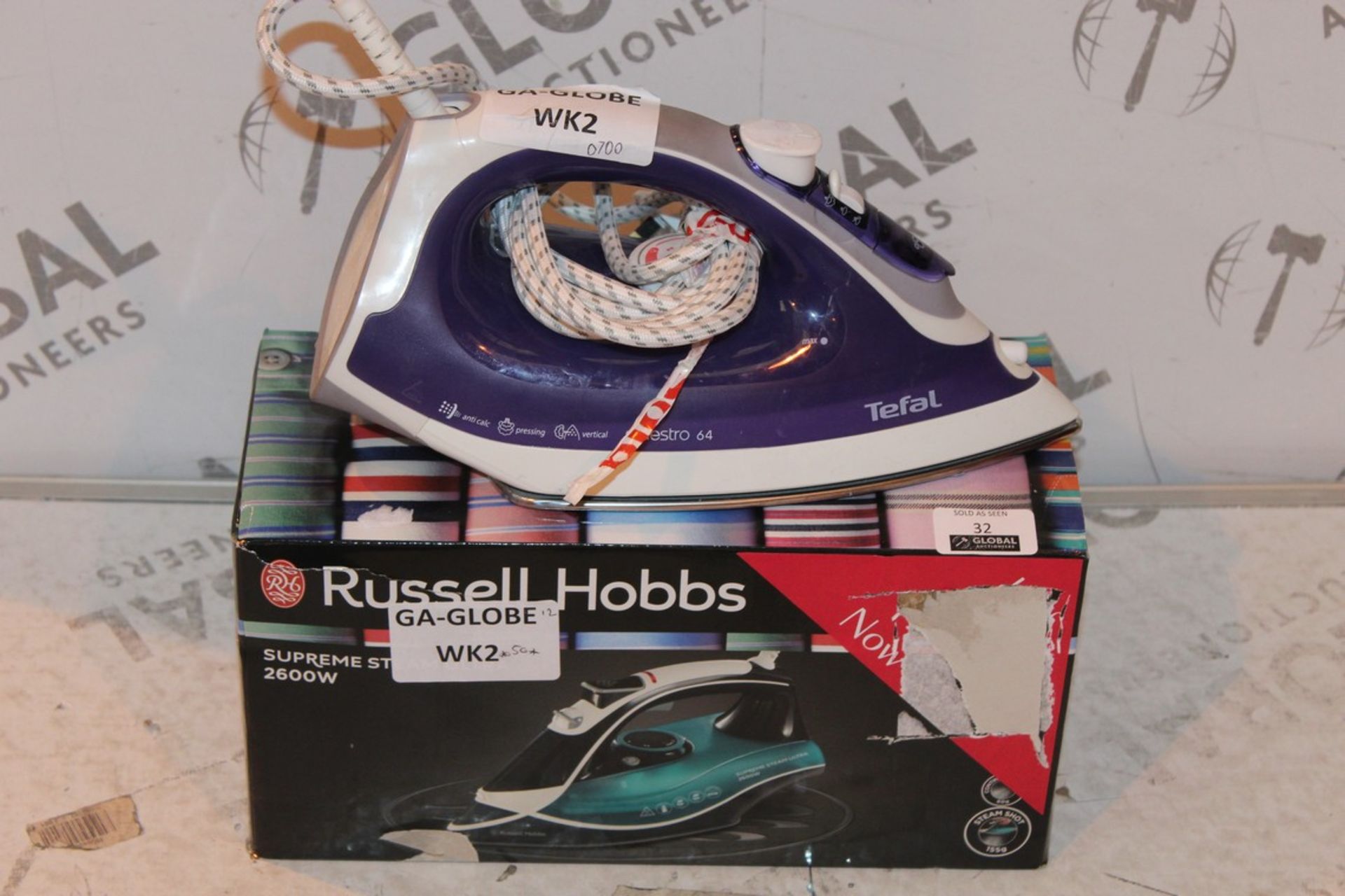 Lot To Contain 2 Assorted Boxed And Unboxed Russell Hobbs And Tefal Steam Irons Combined RRP £120 (