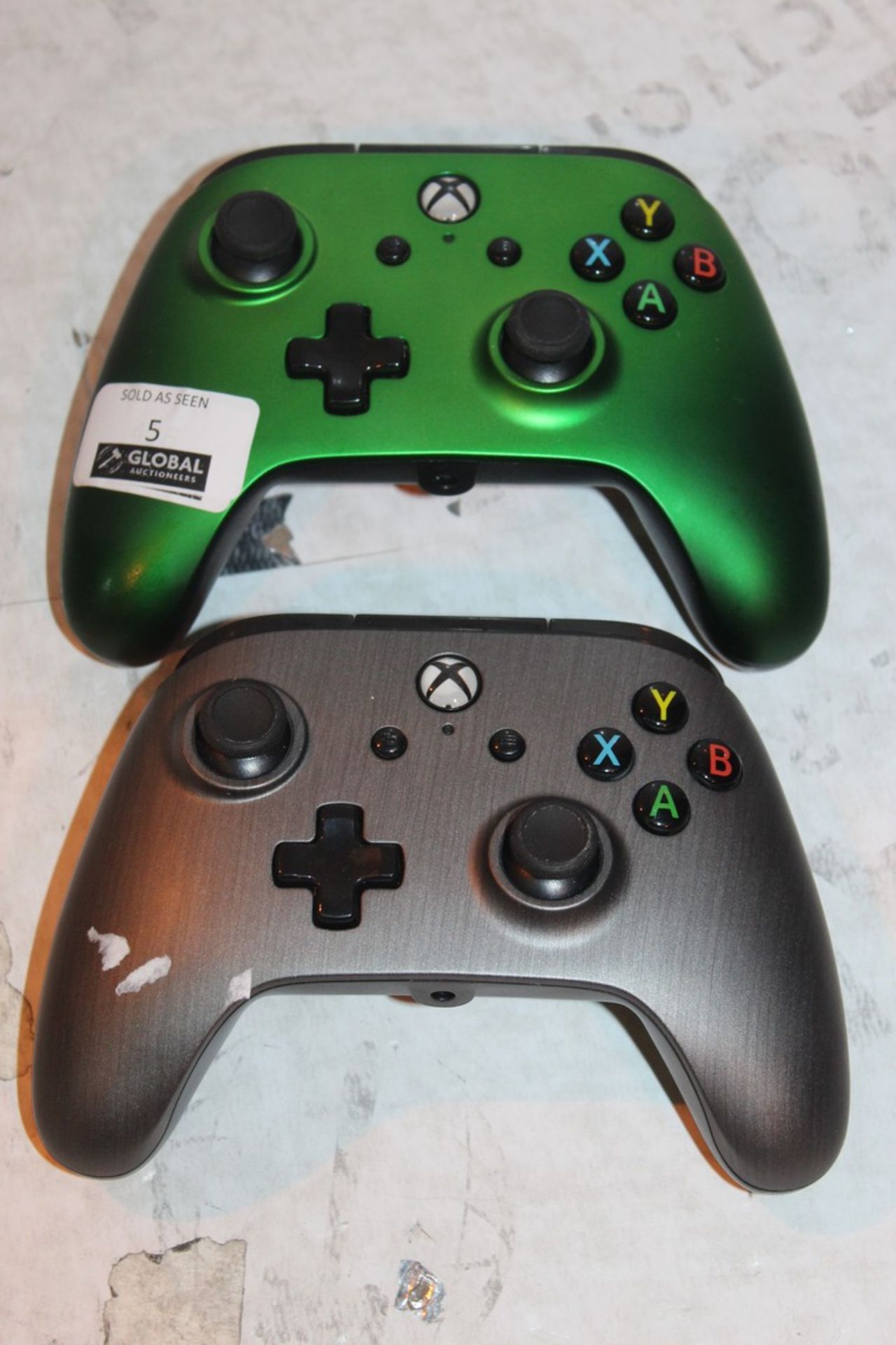 Lot To Contain 2 Xbox 1 Wireless Metallic Green And Metallic Grey Gaming Pads Combined RRP £90 (