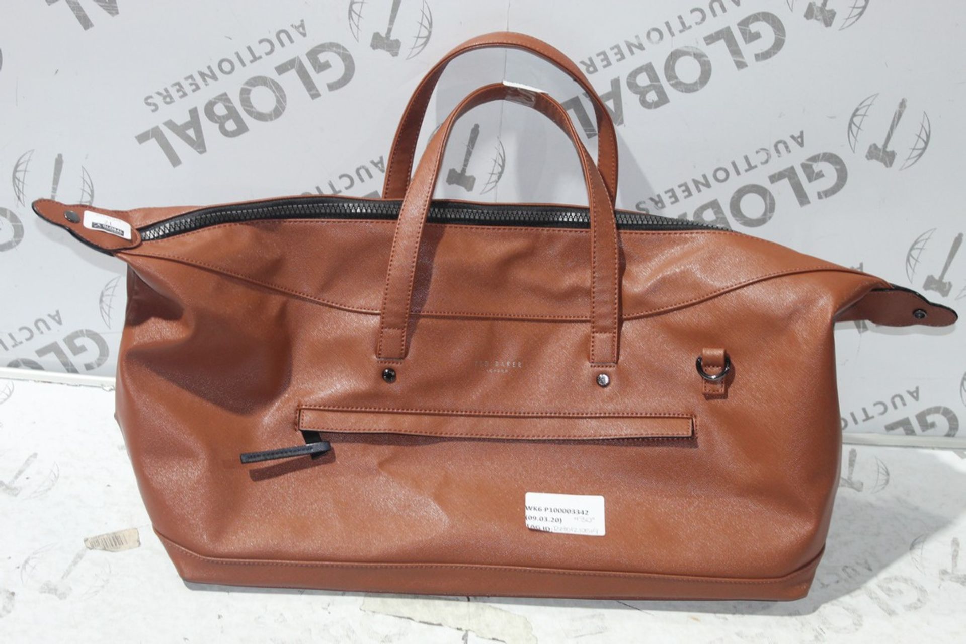 Brown Leather Ted Baker Holdall RRP £130 (RET01210519) (Public Viewings And Appraisals Are