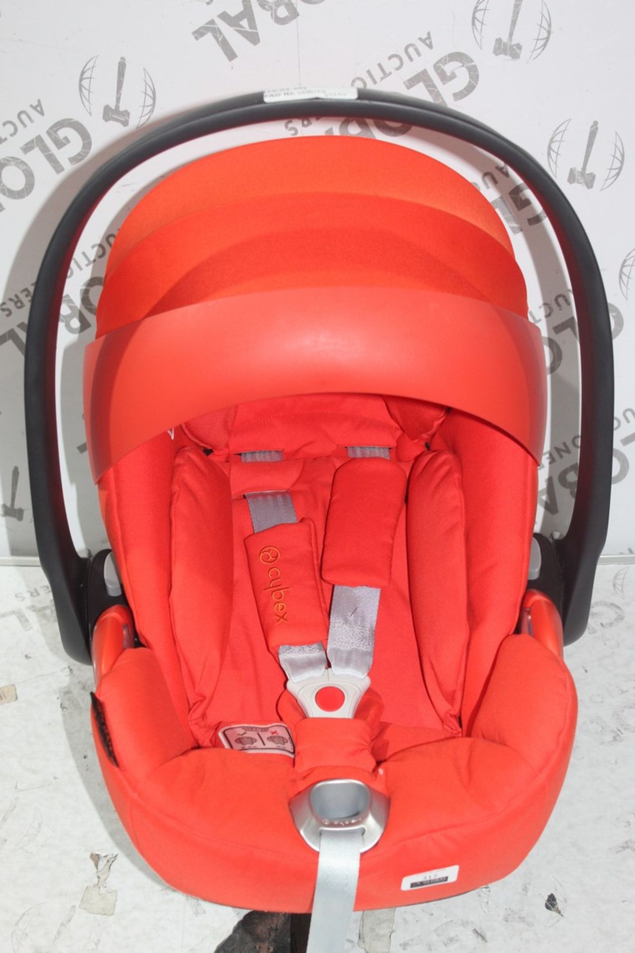 Cybex Platinum In Car Safety Seat In Orange RRP £225 (4990198). (Public Viewings & Appraisals