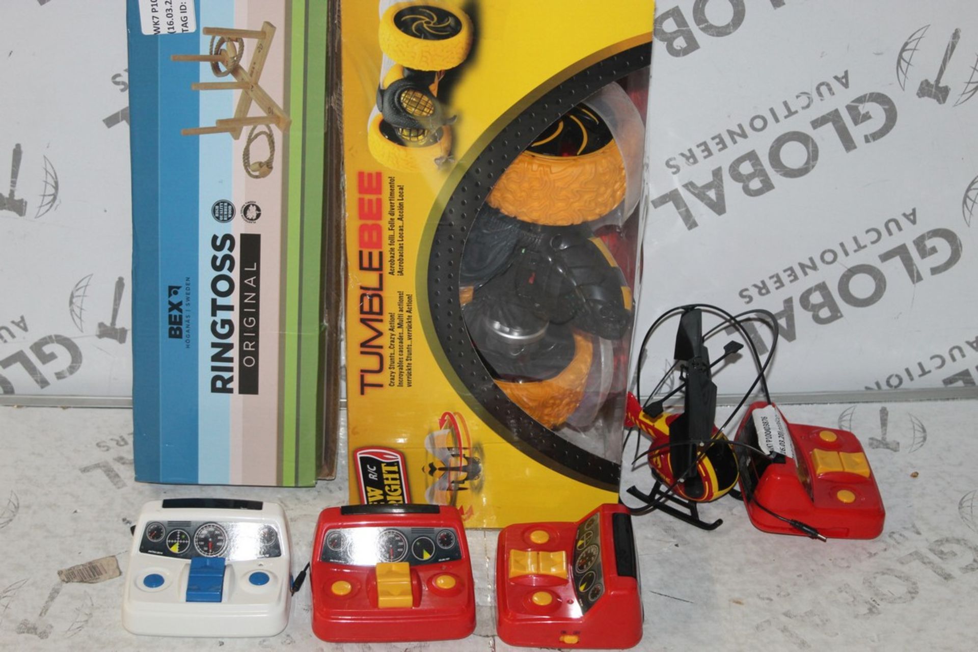 Lot to Contain 10 Assorted Toy Items to Include Helicopters, Remote Control Cars, Ringtoss