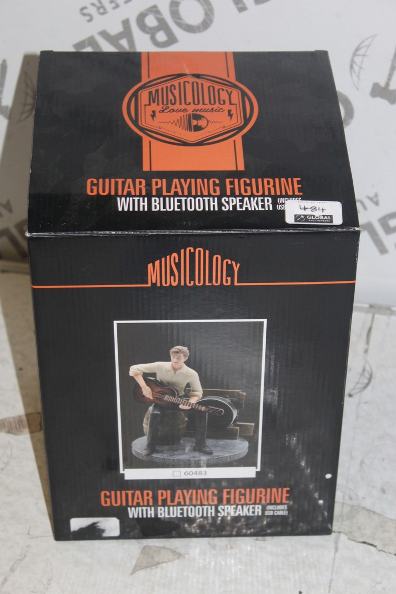 Boxed Guitar Playing Figurine With Built In Bluetooth Soeaker RRP £70 (Public Viewings &