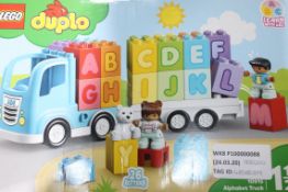 Boxed Assorting Lego Duplo Items To Include Alphabet Truck And 2 Lego Duplo Fire Stations RRP £20-£