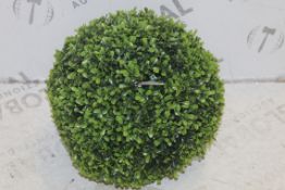 Lot To Contain 2 Assorted Items To Include A Set Of 2 Artificial Grass Balls And A Savino Plus