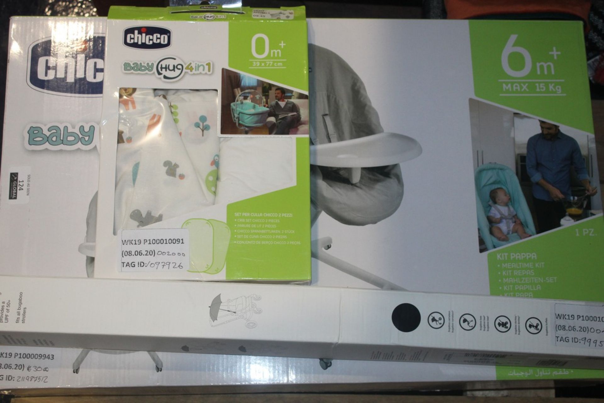 Assorted Items to Include a Bugaboo Parasol, A Chicco Hug 4-in-1 Sheet and Chicco Baby Hug 4-in-1