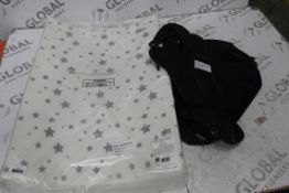 Assorted Items To Include A Baby Bjorn Multi Position Baby Carrier And A Star Print Wedge Changing