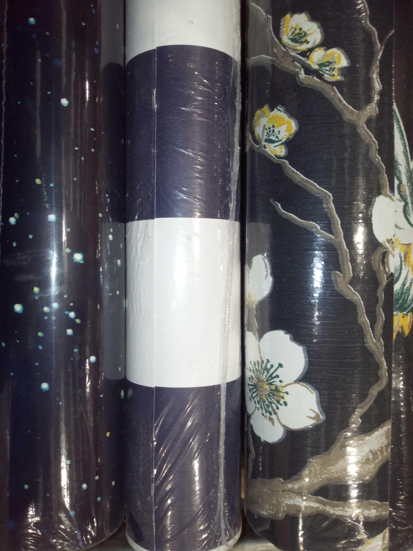 3 assorted rolls of designer wallpaper