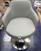 Unboxed grey swivel dining chair