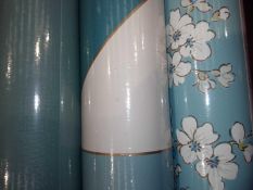 3 assorted rolls of designer wallpaper