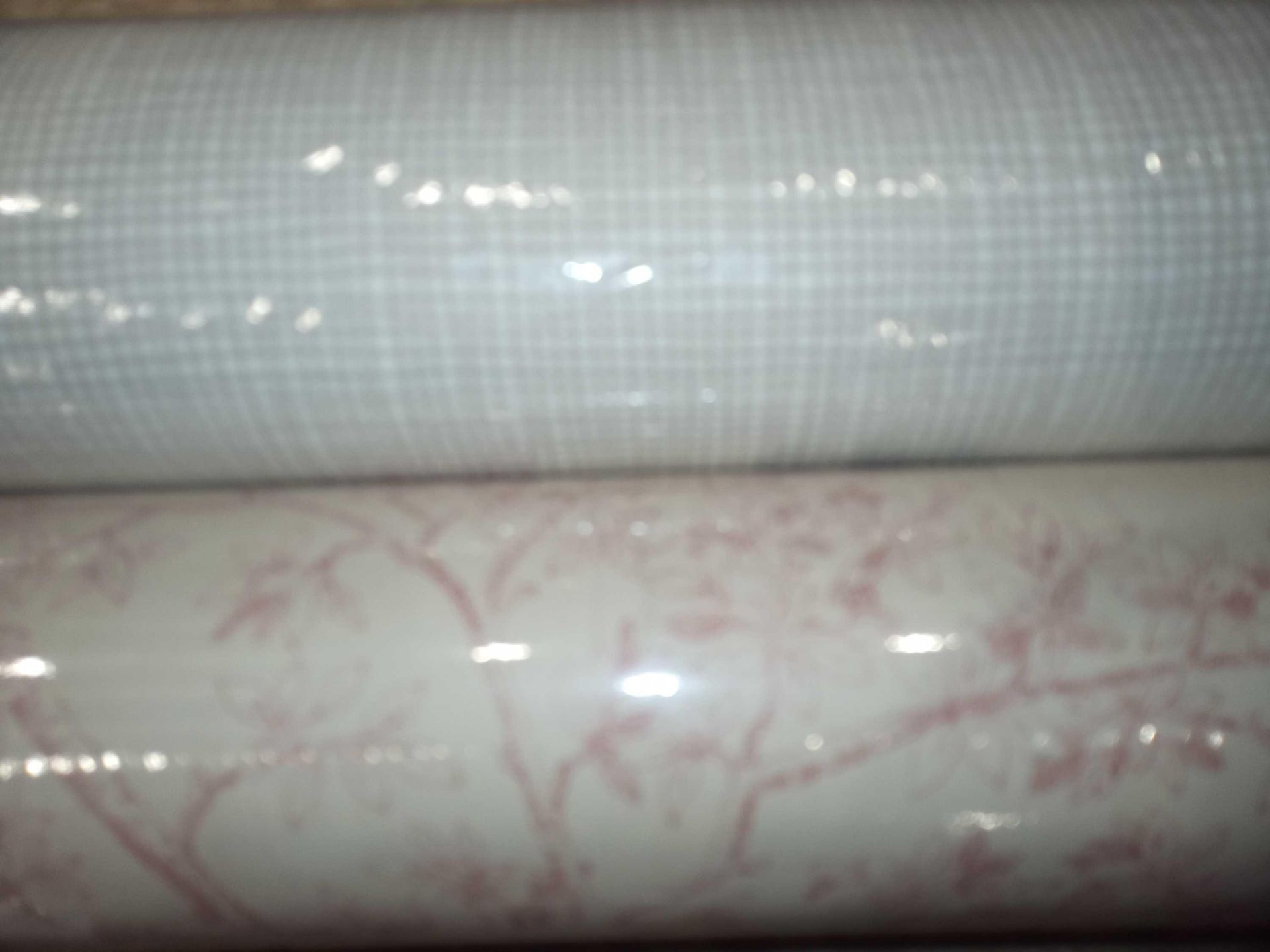 2 assorted rolls of designer wallpaper