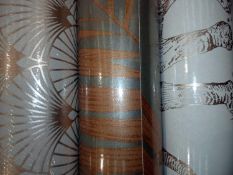 3 assorted rolls of wallpaper