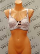 Lot to contain 2 packs of 12 white ladies bra