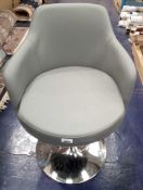 Unboxed grey swivel dining chair