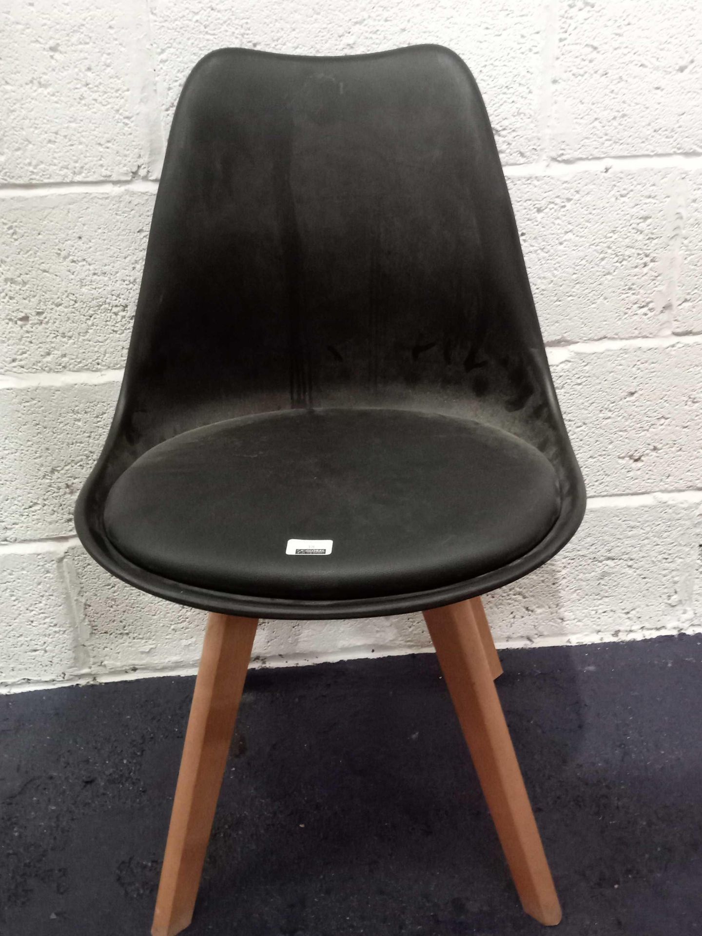 RRP £50. Unboxed Single Black Cushioned Designer Dining Chair