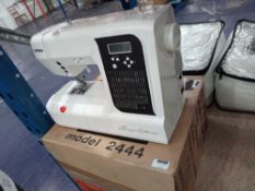 Rrp £800. Boxed Butterick Sewing Machine.