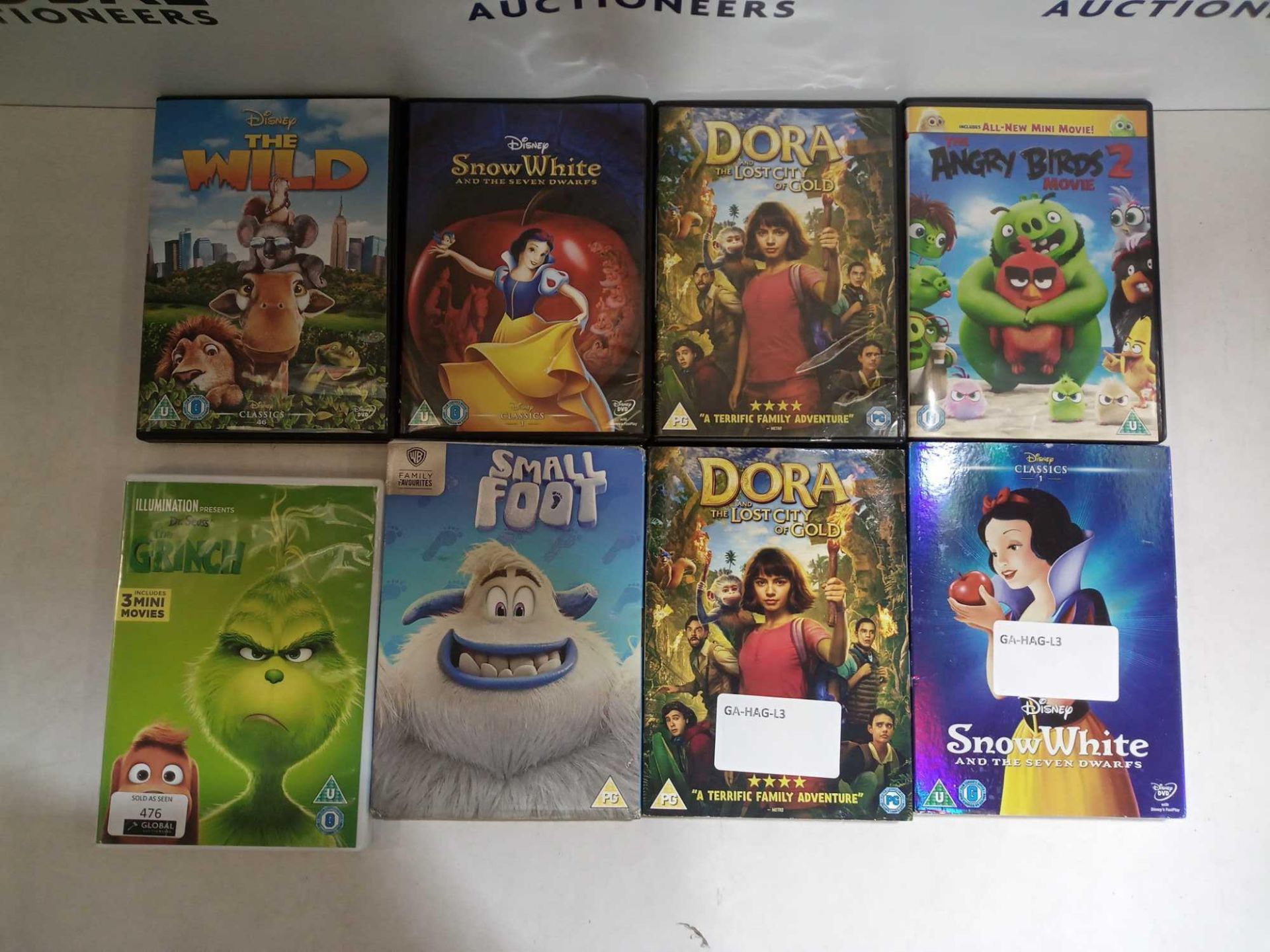 Rrp £100 Lot To Contain Assorted At Children'S Dvds To Include The Grinch Smallfoot Dora The Lost Ci