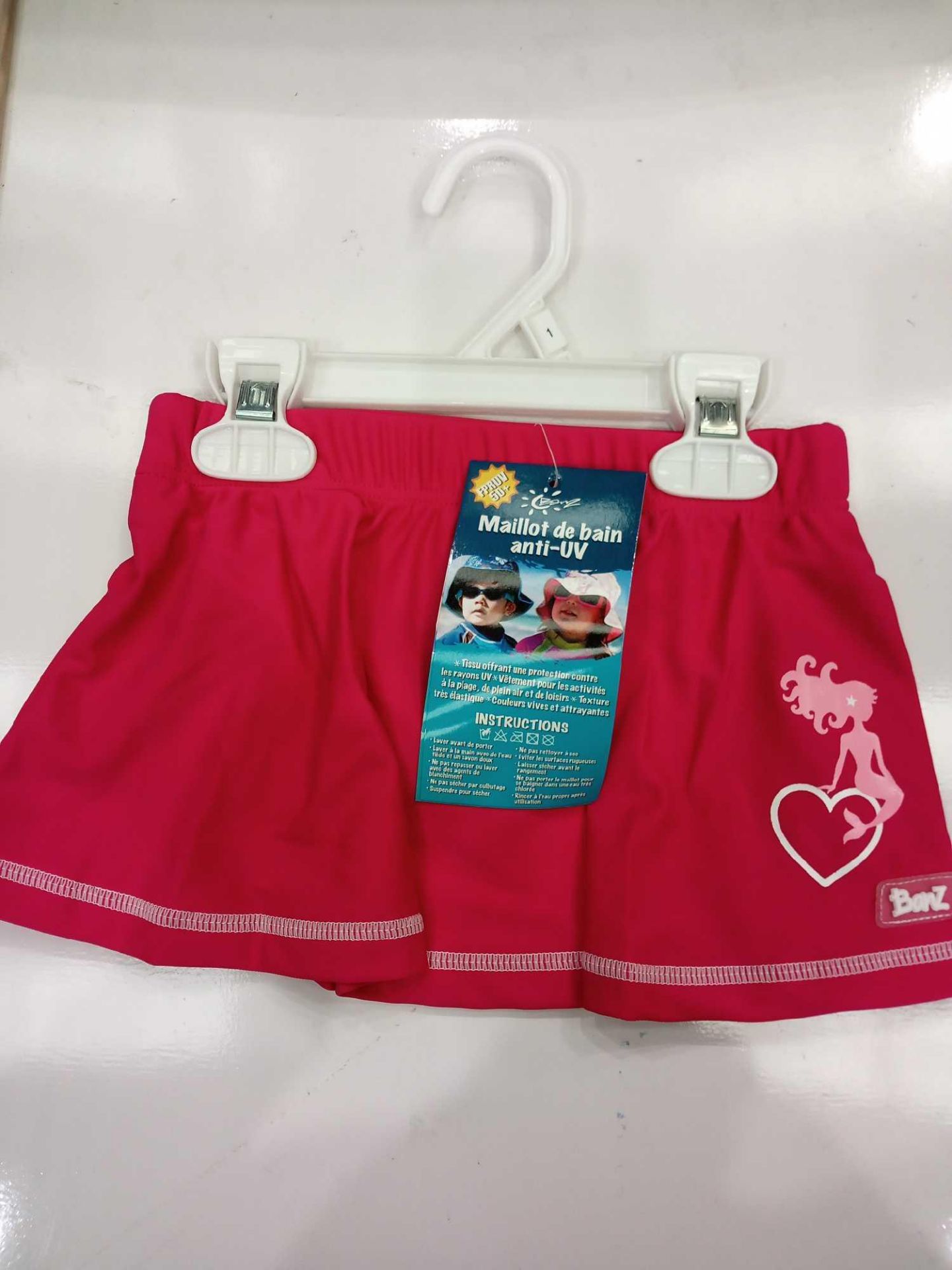 RRP £100 Lot To Contain 20 Brand New Pairs Of Bonz Uv Children'S Pink Swim Skirts