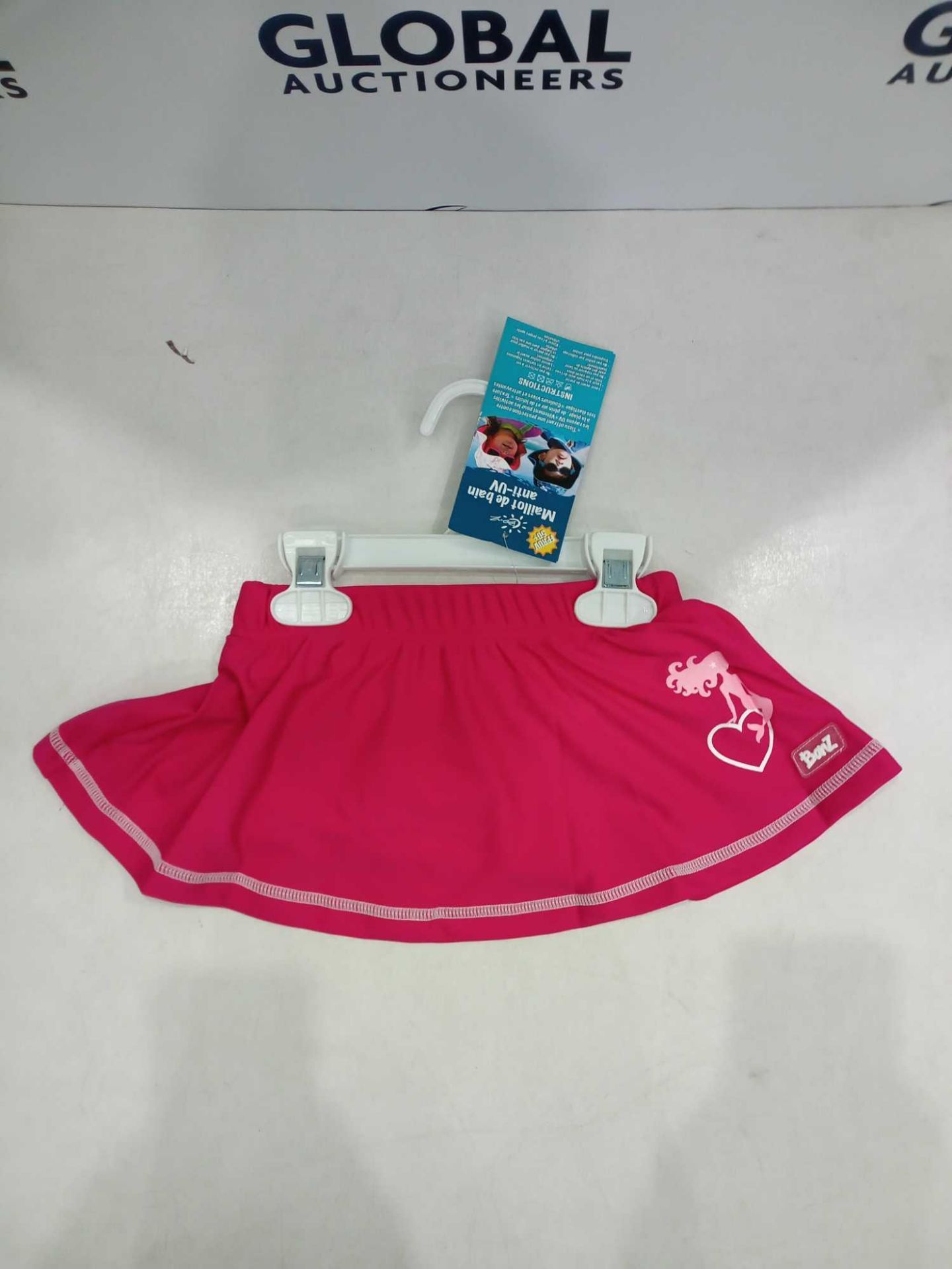 RRP £125 Lot To Contain 25 Brand New Banz Girls Uv Pink Skirts(Appraisals Available On Request) (