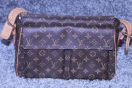 RRP £1700 Louis Vuitton Viva Cite Handbag In Brown Coated Monogram Canvas. Condition Rating A (