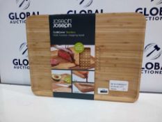 Rrp £100 Lot To Contain 4 Assorted Kitchen Items To Include Joseph Joseph Carving Board And Emma Bri
