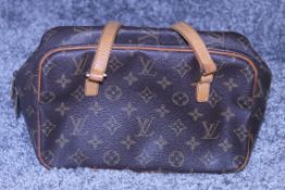 RRP £1400 Louis Vuitton Cite Shoulder Bag In Brown Coated Monogram Canvas. Condition Rating B (